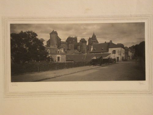 Street scene with houses and church, Vitré, France