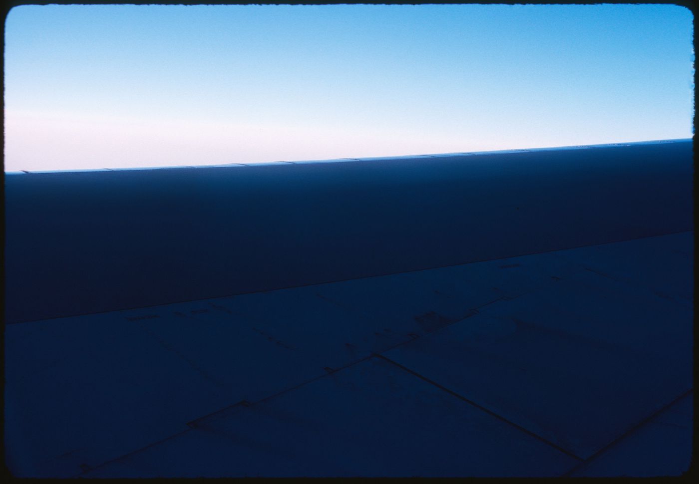 Airplane wing on a flight to Paris