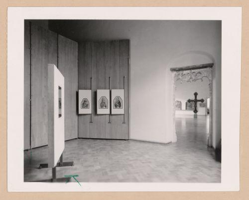Interior view of a gallery showing paintings with Il Salone in the right background, Palazzo Abatellis, Galleria regionale della Sicilia, Palermo, Italy