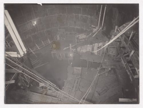 Construction of the Paris Metro, interior view of tunnel with large circular water filled pit, Paris, France