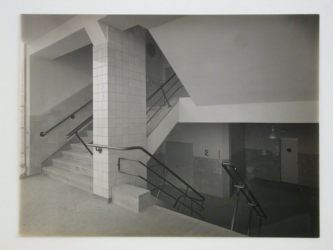 Interior view of an unidentified stairwell with tiled walls, Netherlands