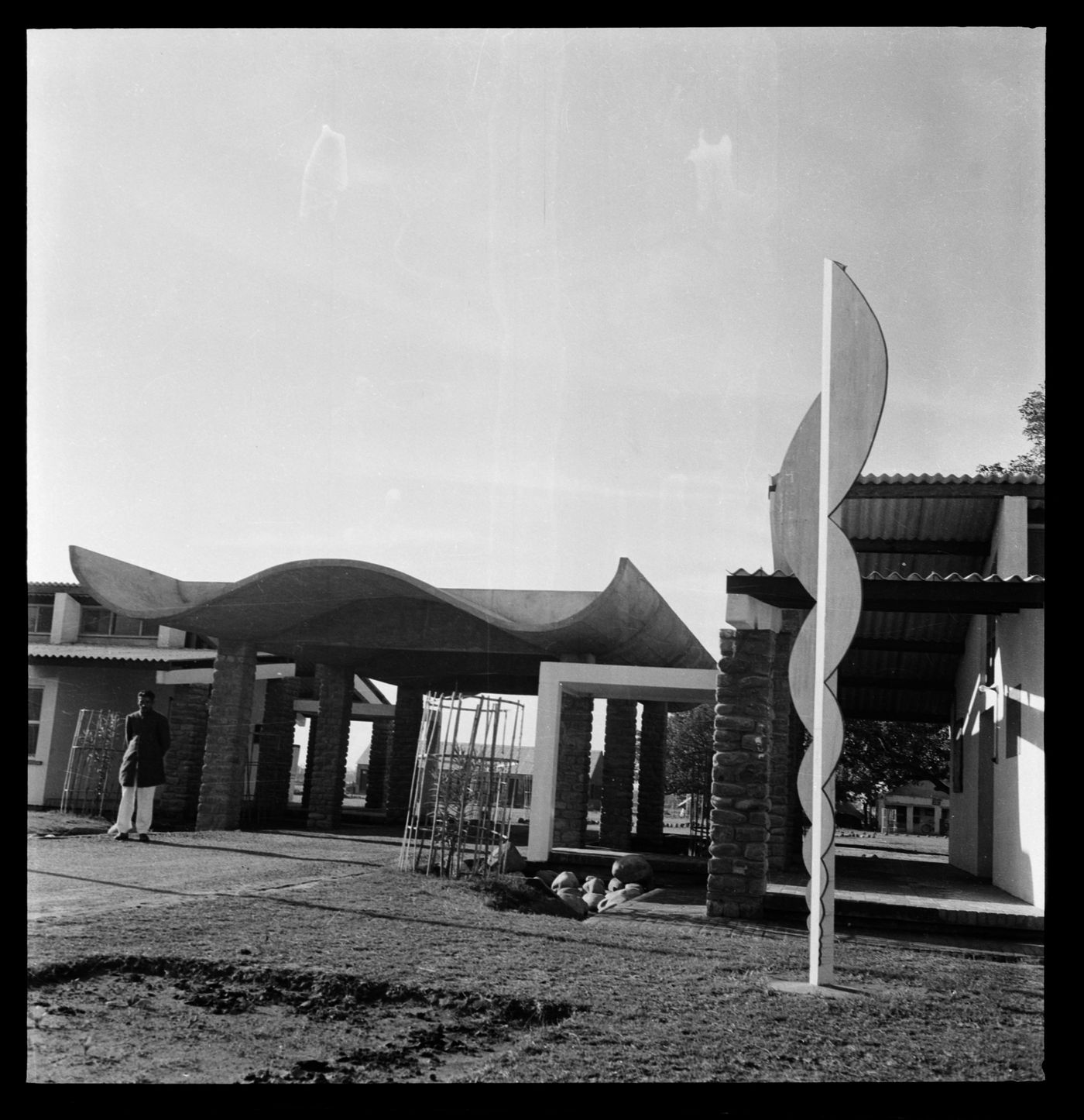 View of the Architect's Office's portico and a sculpture, Sector 19, Chandigarh, India