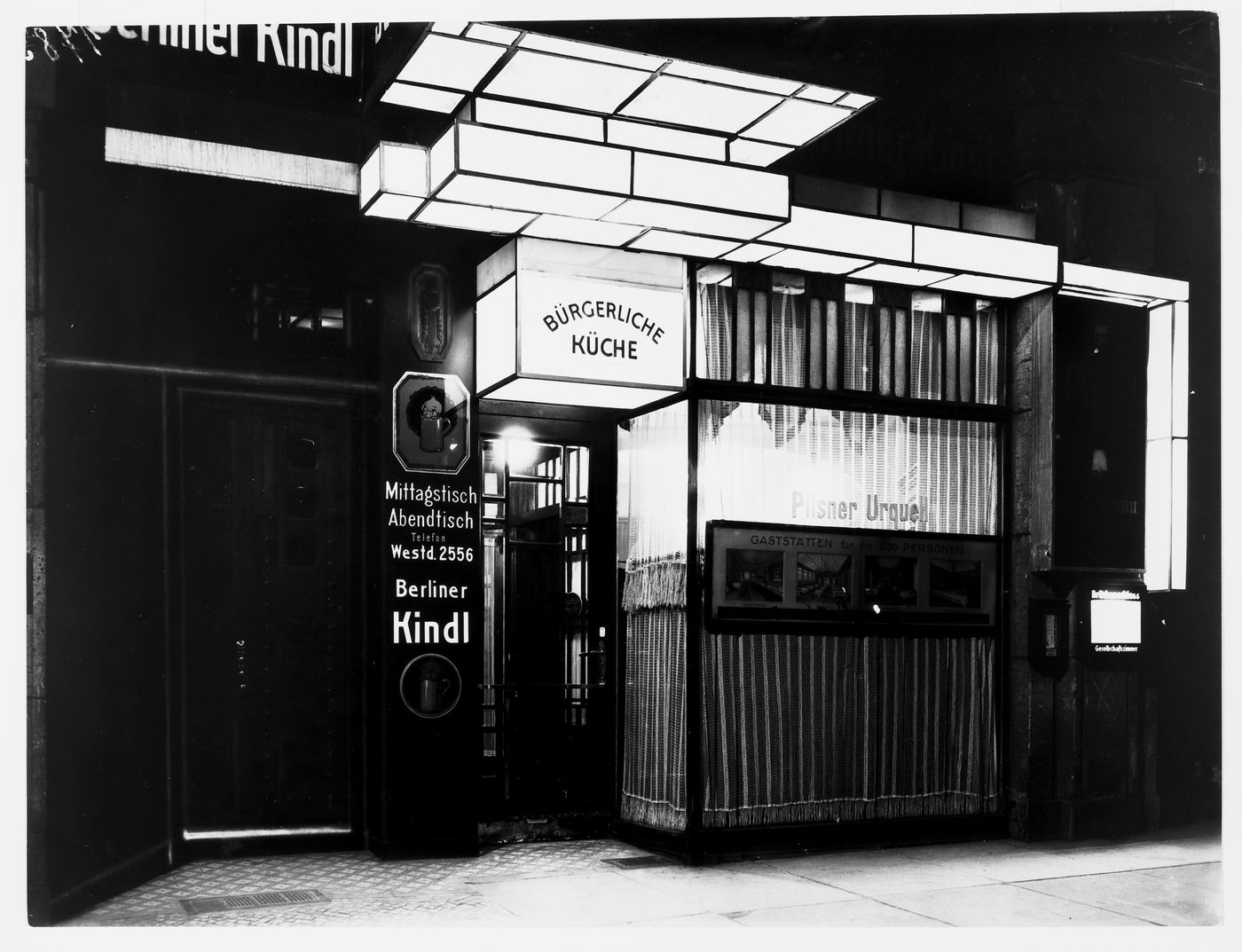 Night view of illuminated entrance to a bar, Berlin, Germany