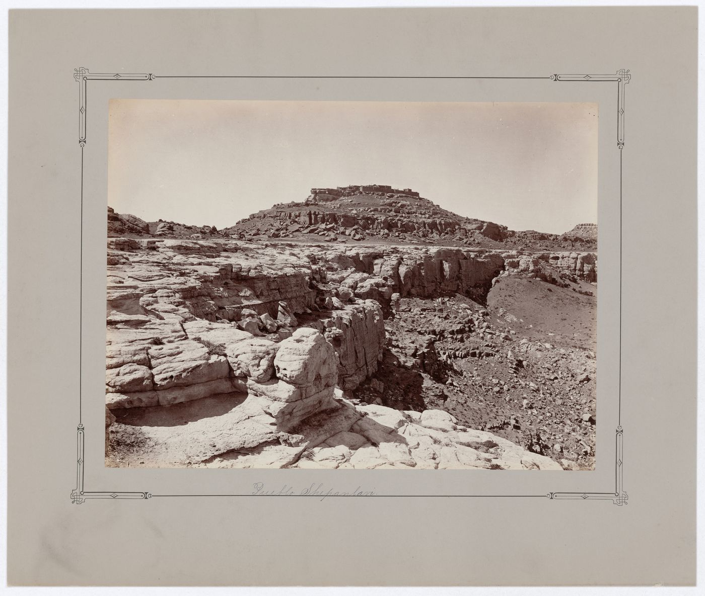 Distant view of Shipaulavi (now Sipaulovi) on the Second Mesa from below, Hopi Reservation, Arizona, United States