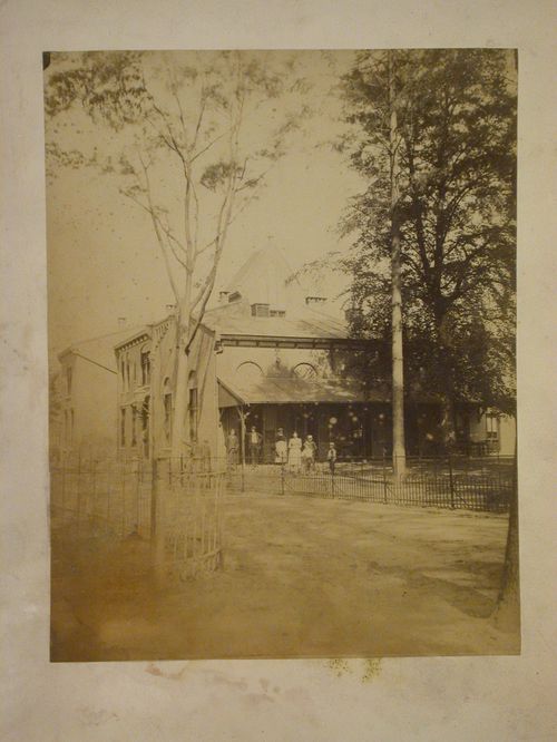 View of the principal and lateral façades of Volkshuis te Lochem [Community Centre at Lochem] from across the street, Dr. Rivestraat 3, Netherlands