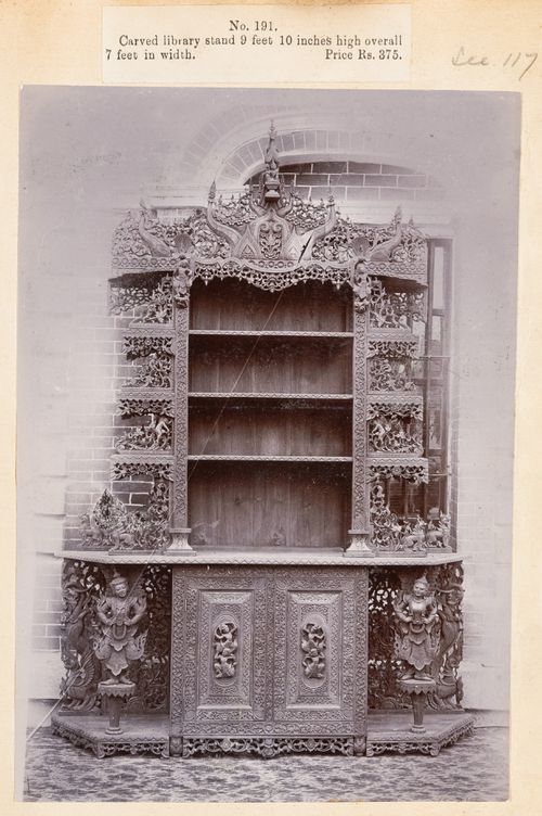 View of a bookshelf, F. Beato Limited, C Road, Mandalay, Burma (now Myanmar)