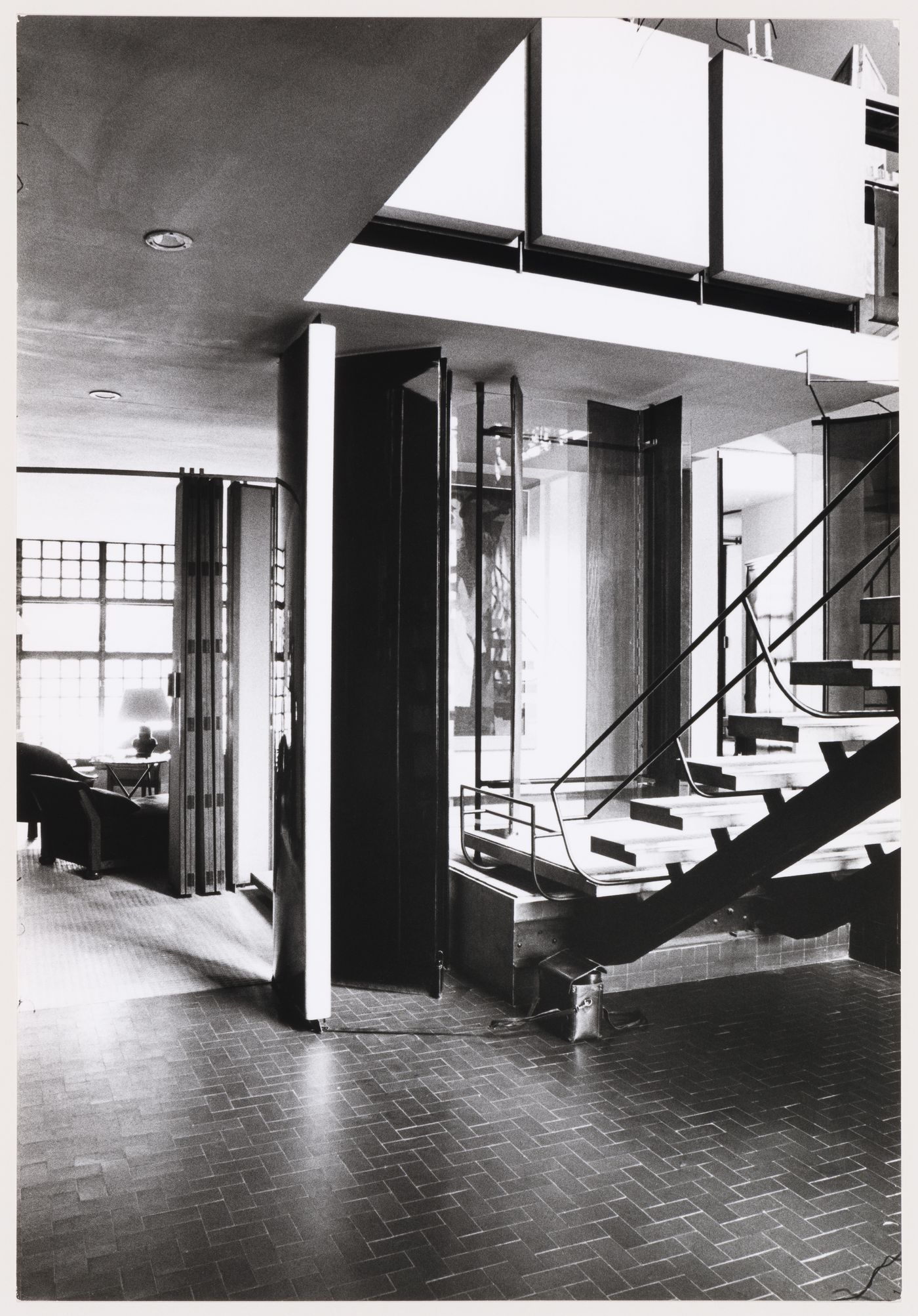 Interior view of Maison de Verre, Paris, France, showing patients' waiting area viewed from service hall