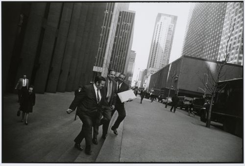 Businessmen on steps, New York