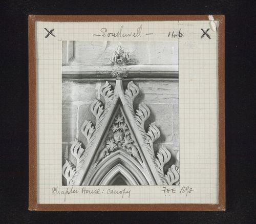 View of canopy with foliate mask and two birds on tympanum in Chapter House, Southwell Minster, Southwell, Nottinghamshire, England