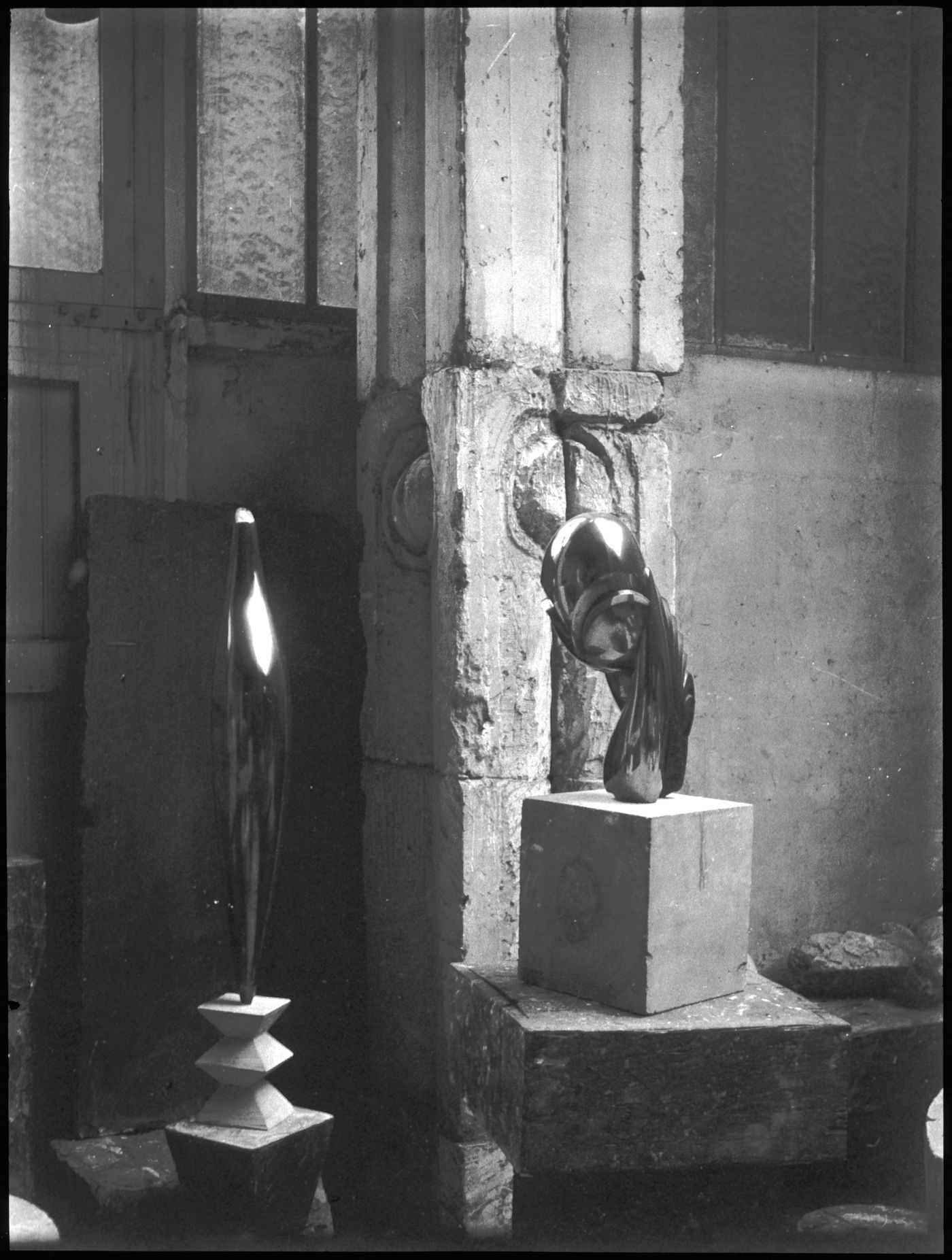 Interior view of studio, with Bird in flight and portrait head, Paris, France