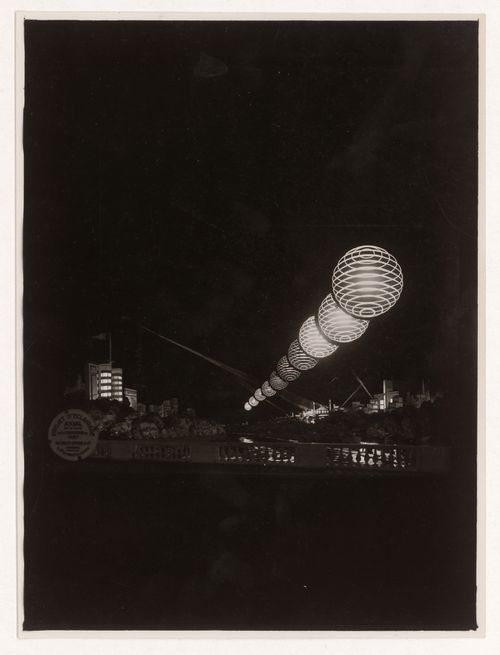 View of light exhibiton over the Seine at night for l'Exposition internationale des arts et techniques dans la vie moderne, Paris, France