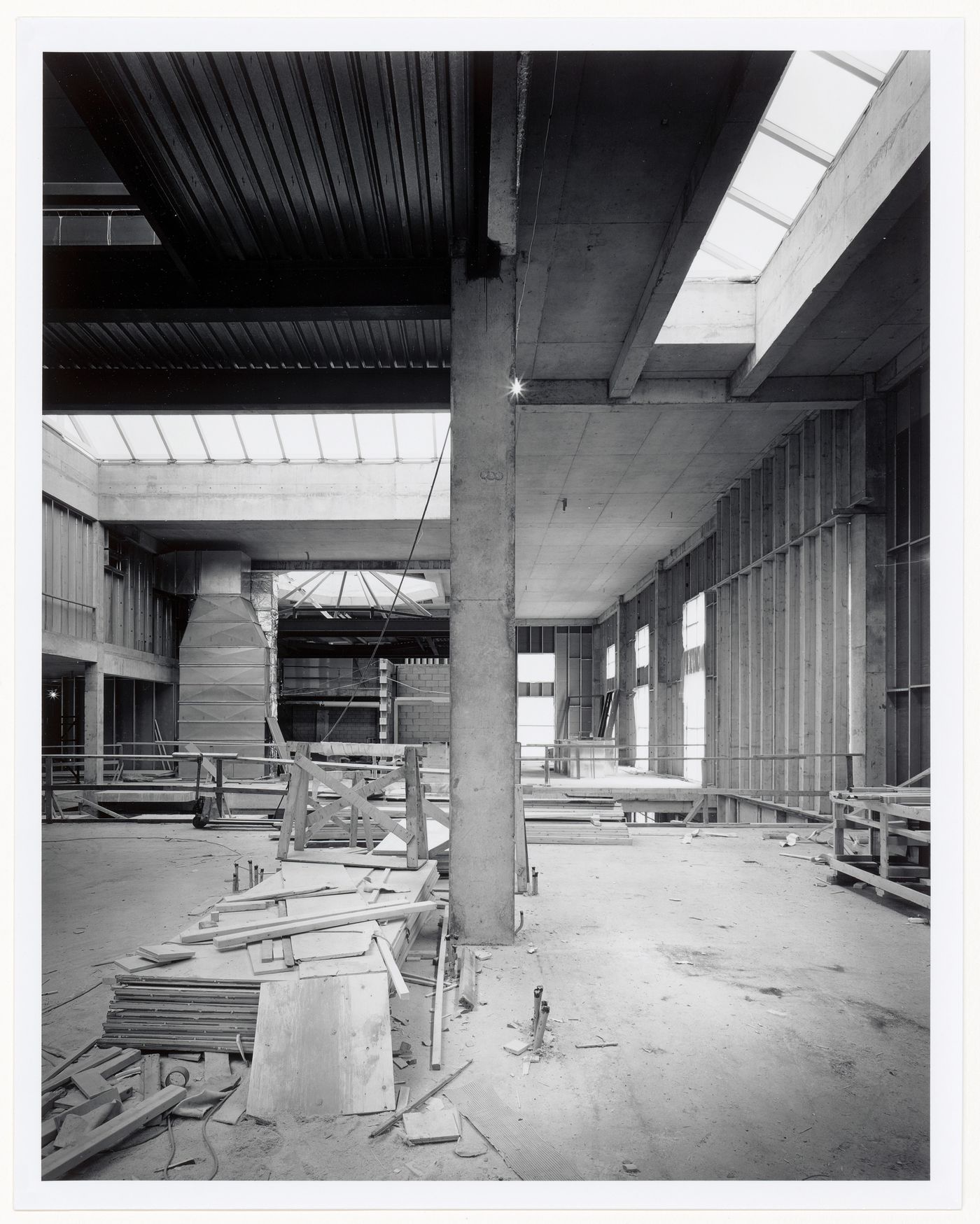 Interior view of the Octagonal Gallery and bookstore from the main exhibition galleries, Canadian Centre for Architecture under construction, Montréal, Québec