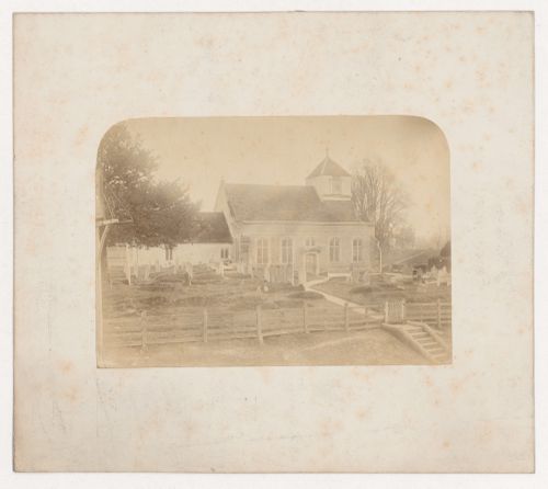 View of the north façade of the Church of All Saints showing its cemetery, Whiteparish, Wiltshire, England