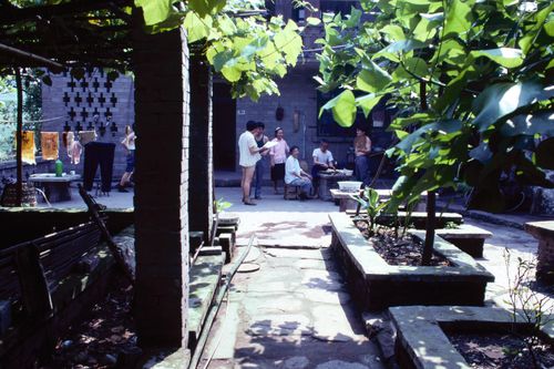 View of house courtyard and residents used for "Village Upgrading" training package based on research paper "Housing a Billion: Volume 2: Village Upgrading: Jianlu, China"
