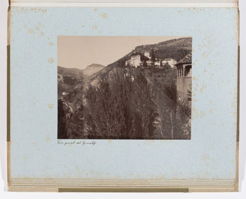 View of Generalife, Alhambra, and Granada in the distance, from Hall of the Ambassadors in Alhambra, Granada, Spain
