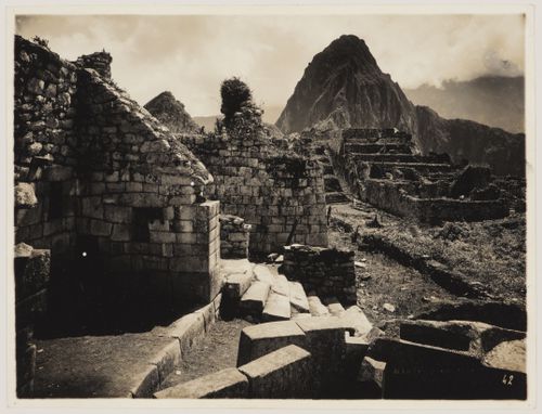 View of the Industrial Sector showing a staircase and buildings, including the Double Masma on the right, taken from the principal liturgical bath and the Serpent Gate, Machu Picchu, Peru