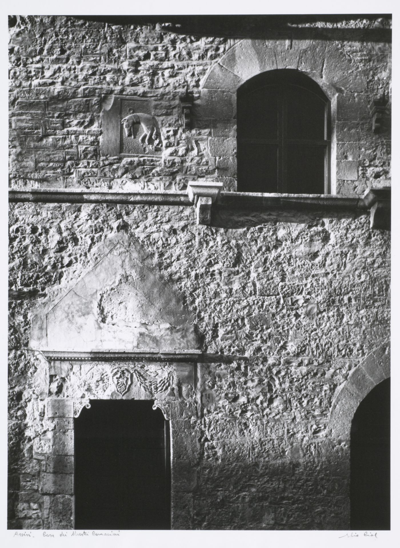 Casa dei Maestri Comacini, detail of façade, Assisi, Italy