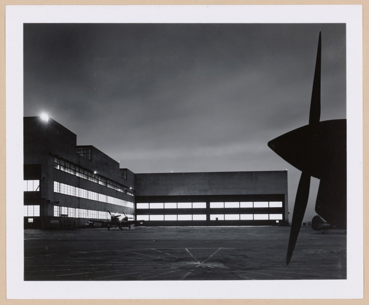 View of the east façade of the Assembly Building of the Buffalo Airport Assembly Plant at night, Curtiss-Wright Corporation Airplane division, Buffalo, New York