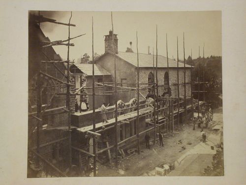 Partial view of the north façade of Voelas Hall under construction showing a portion of the former manor house "Lima" prior to being enclosed into the new hall, Pentrefoelas, Denbighshire, Wales