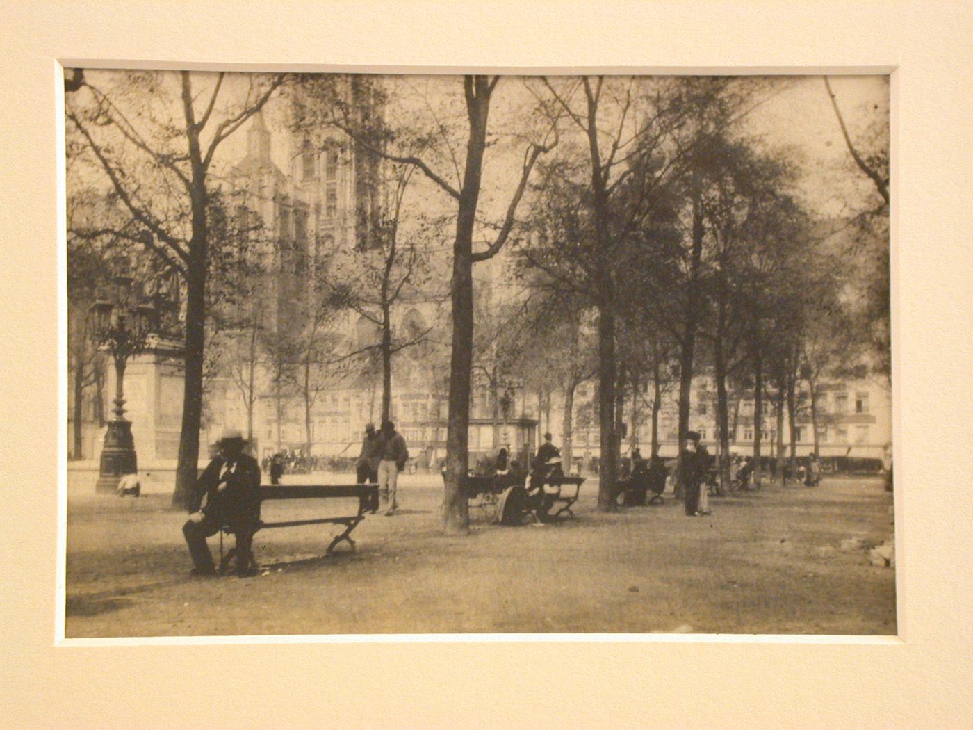 People sitting and strolling in a park, New York City, New York, United States