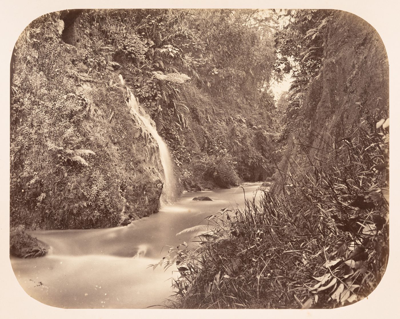View of a ravine, a waterfall and a stream, Buitenzorg (now Bogor), Dutch East Indies (now Indonesia)