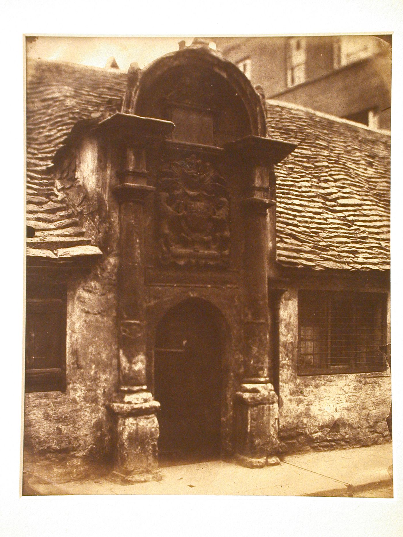 View of entrance and carved overdoor panel, Bellott's Hospital, Bath, England