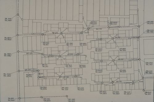Site plan showing calculations between unidentified services for the Aranya Housing Project, Indore, India