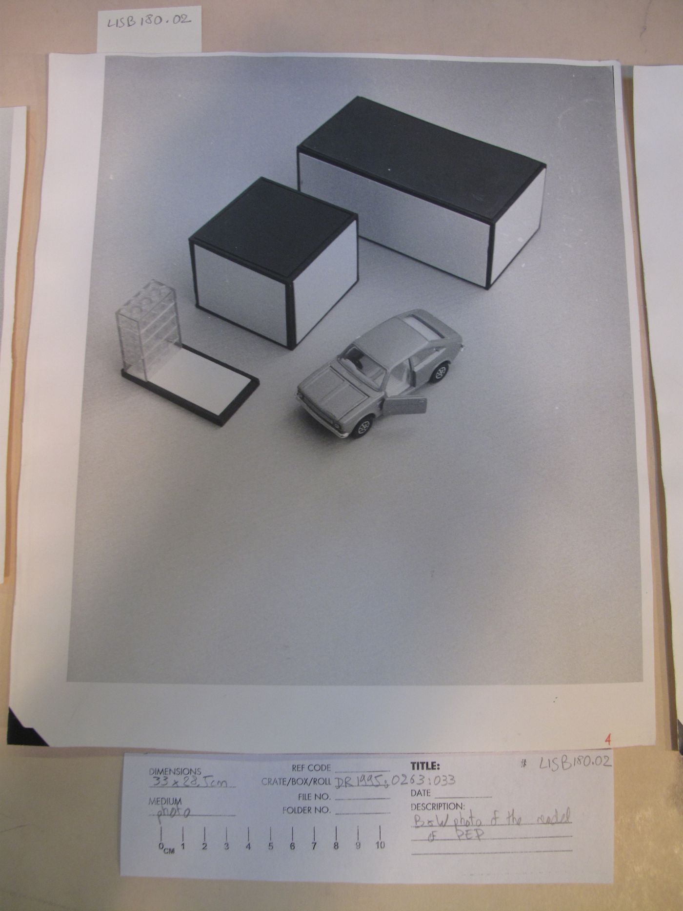 McAppy: view of elements from the model for the Portable Enclosures Programme (two portable enclosures with a car)