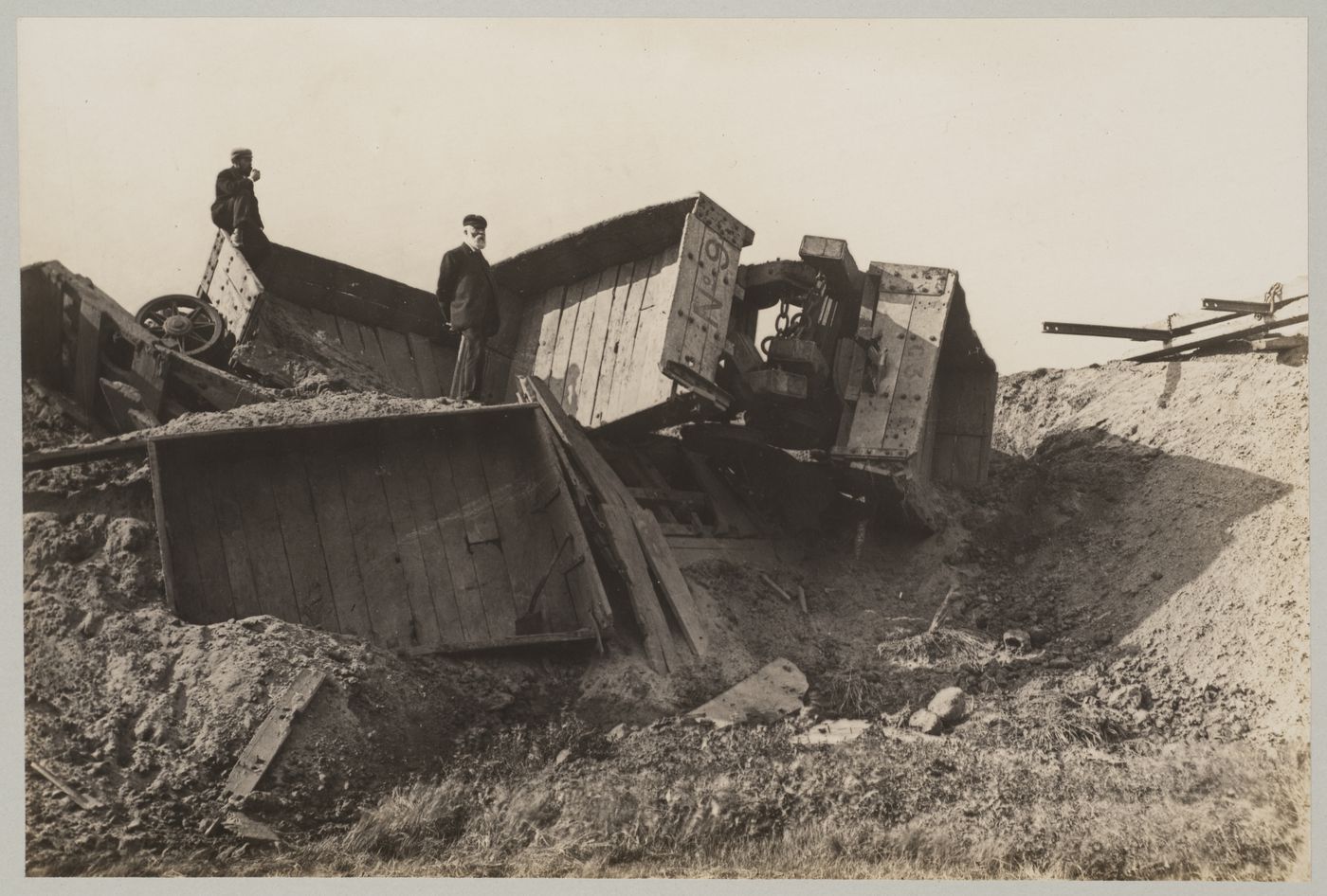 View of a railway accident showing derailed tip wagons, Lymm, England