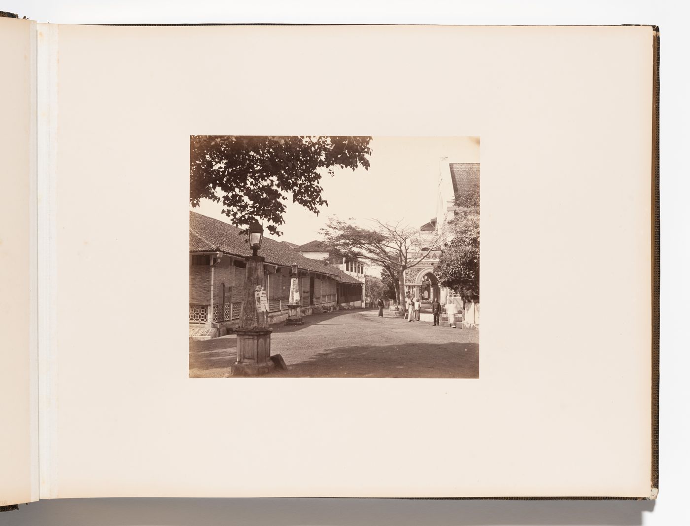 View of a square showing unidentified buildings and the portico of a church, Point de Galle (now Galle), Ceylon (now Sri Lanka)