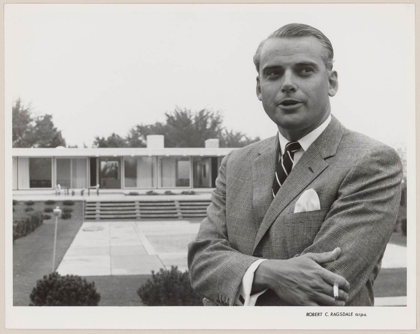 Parkin in front of his home at 75 The Bridle Path, North York