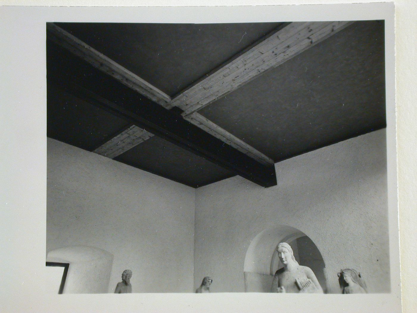 Interior view of a gallery showing the ceiling and the upper portions of the statues, Museo di Castelvecchio, Verona, Italy
