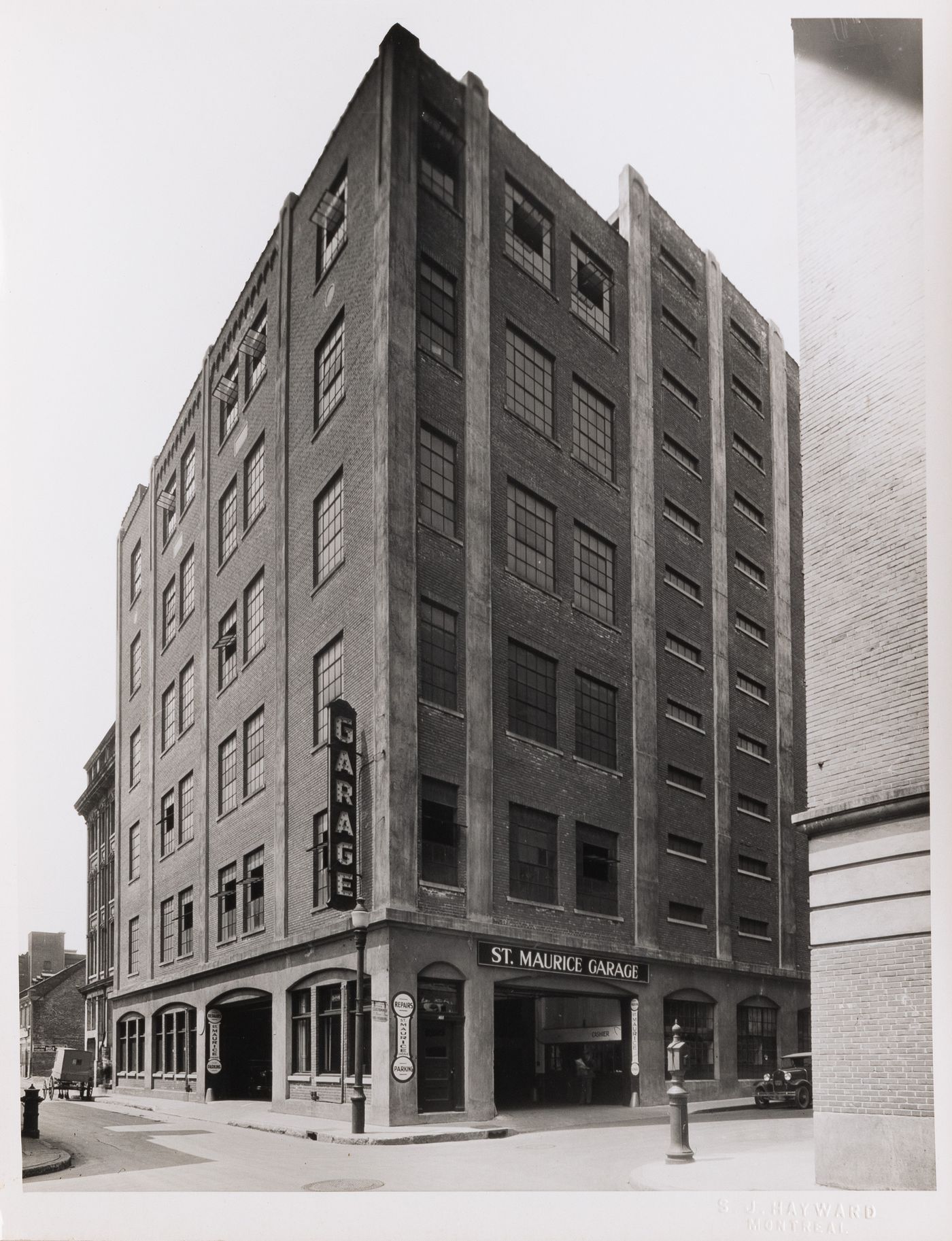 View of the principal and lateral façades of St. Maurice Garage, Montréal [?], Québec