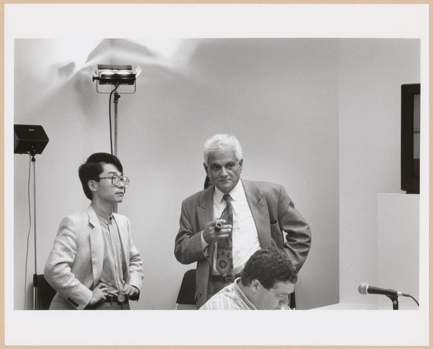 Photograph of Akira Asana and Jacques Derrida at Anywhere Conference