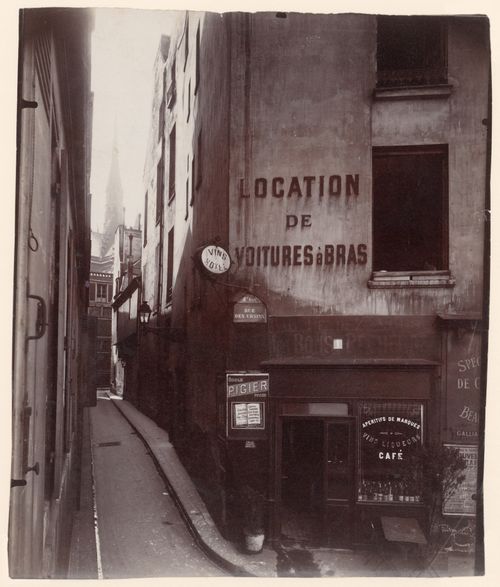View down rue de Chantres, with spire of Notre-Dame de Paris in distance, Paris, France