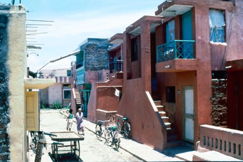View of street with inhabitants in Aranya for the Aranya Housing Project, Indore, India