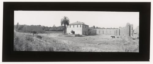 View of a country house [?] surrounded by walls in ruins, Rome [?], Italy