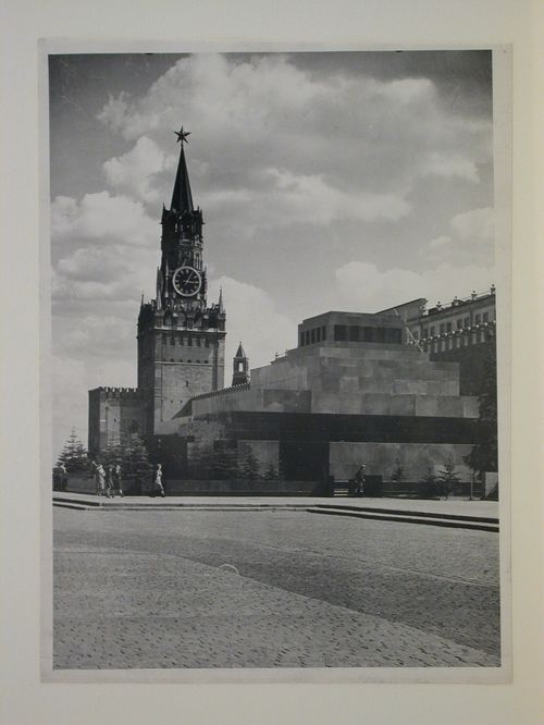 View of the stone Lenin Mausoleum with the Sapasskaia Tower in the background, Red Square, Moscow