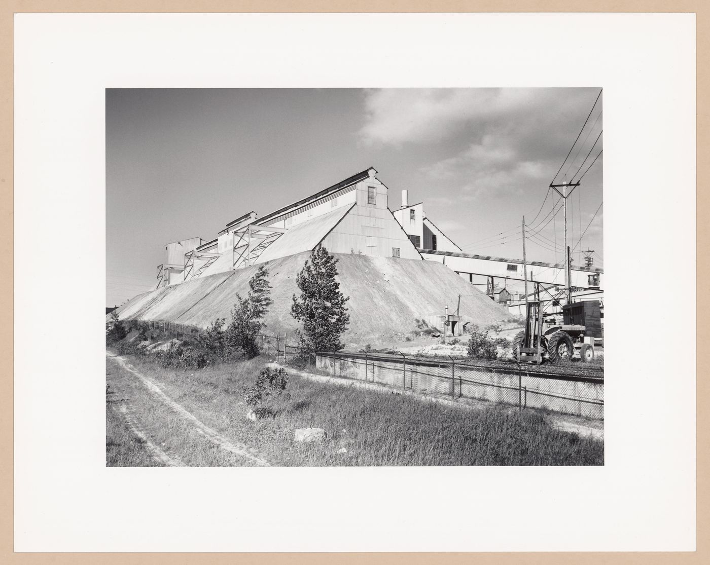 Storage sheds and conveyors, Société Asbestos Ltee., Thetford Mines, Québec, from the series The Forms of Canadian Industrial Architecture