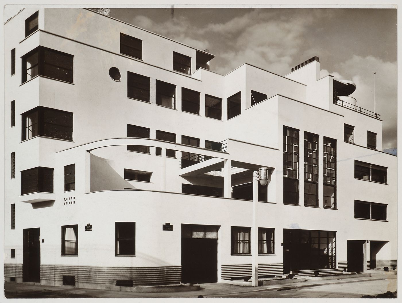 Corner view of main façade of double house, with Mallet-Stevens House and Offices on the left (no. 12) and Martel House on the right (no. 10), rue Mallet-Stevens, Auteuil district, Paris, France