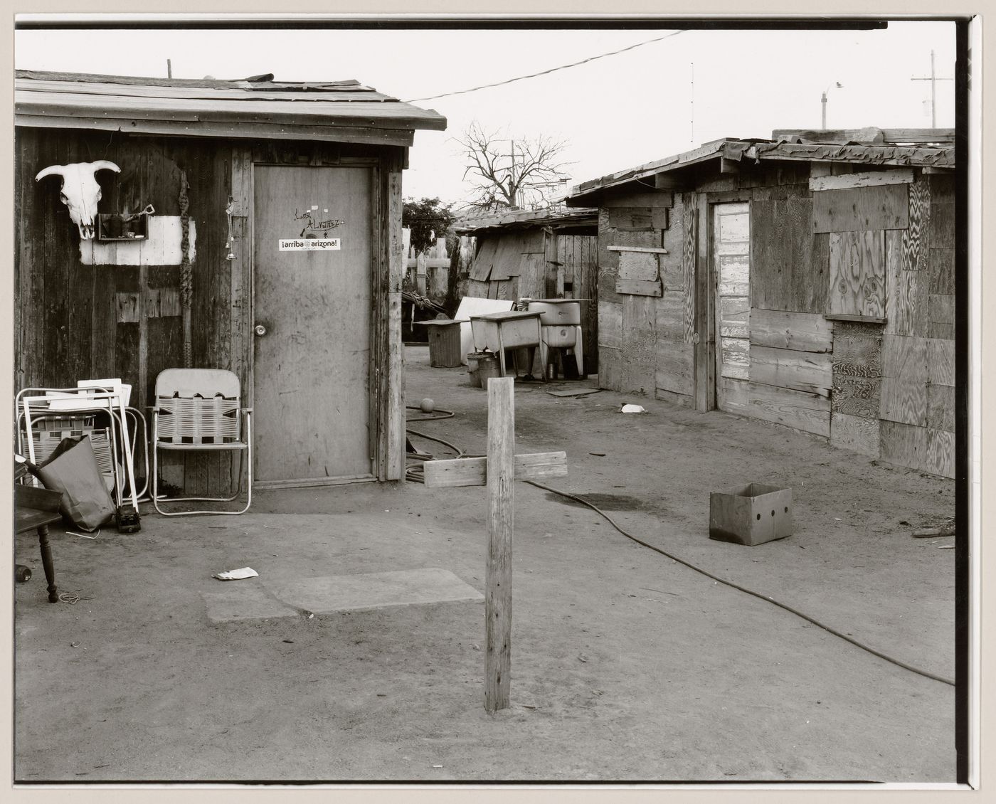 View of cross in yard, Old Pascua, Tucson, Arizona, United States (from a series documenting the Yaqui community of Old Pascua)