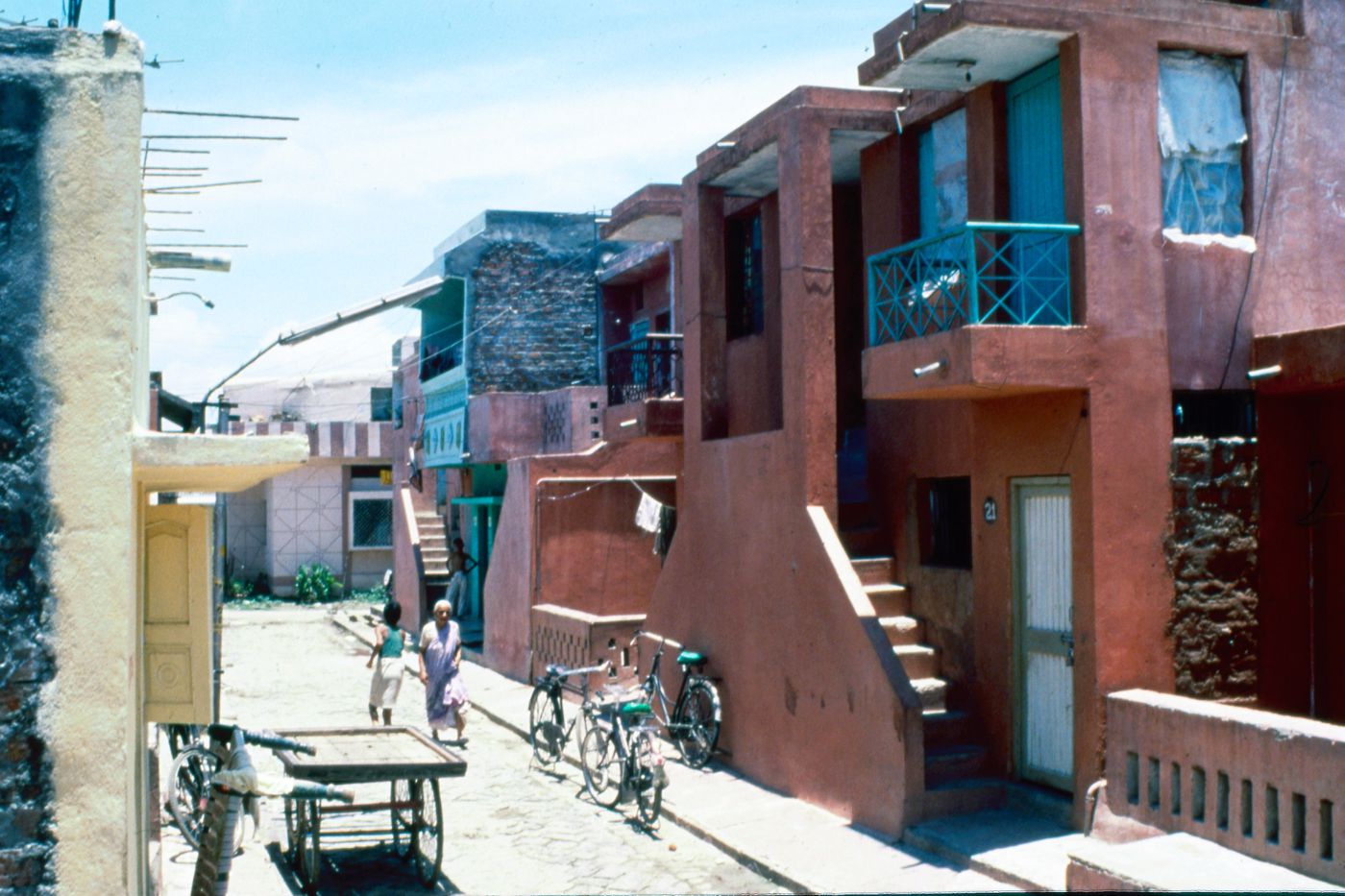 View of street with inhabitants in Aranya for the Aranya Housing Project, Indore, India