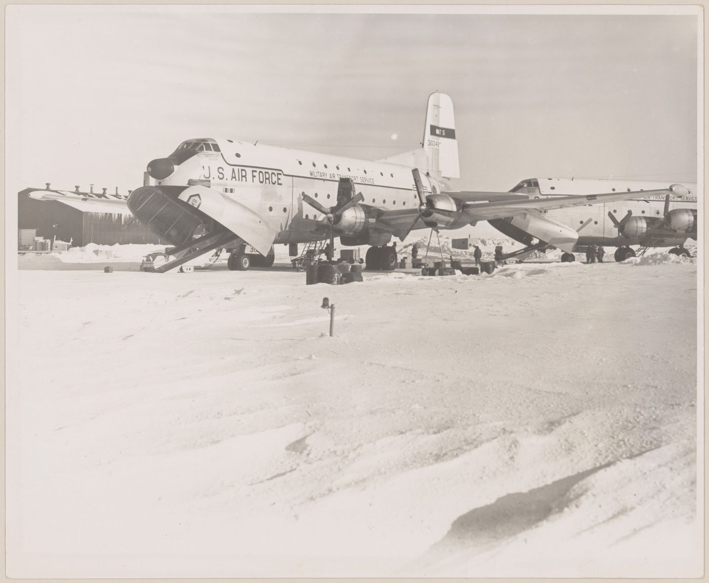 View of U.S. Air Force Military Air Transport Service planes at DEW Line radar station BAR-Main, Kaktovik, Alaska, United States