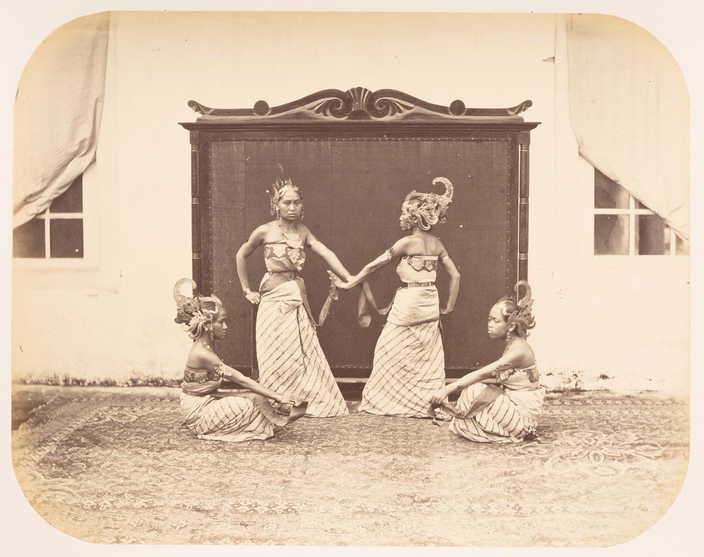Group portrait of bedoyo dancers, Bandong (now Bandung), Dutch East Indies (now Indonesia)