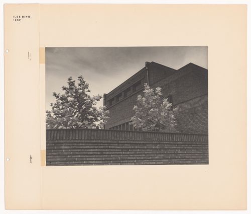 View of a brick building, a wall and trees in the New Jewish Cemetery [Neuer Jüdischer Friedhof], Frankfurt am Main, Germany