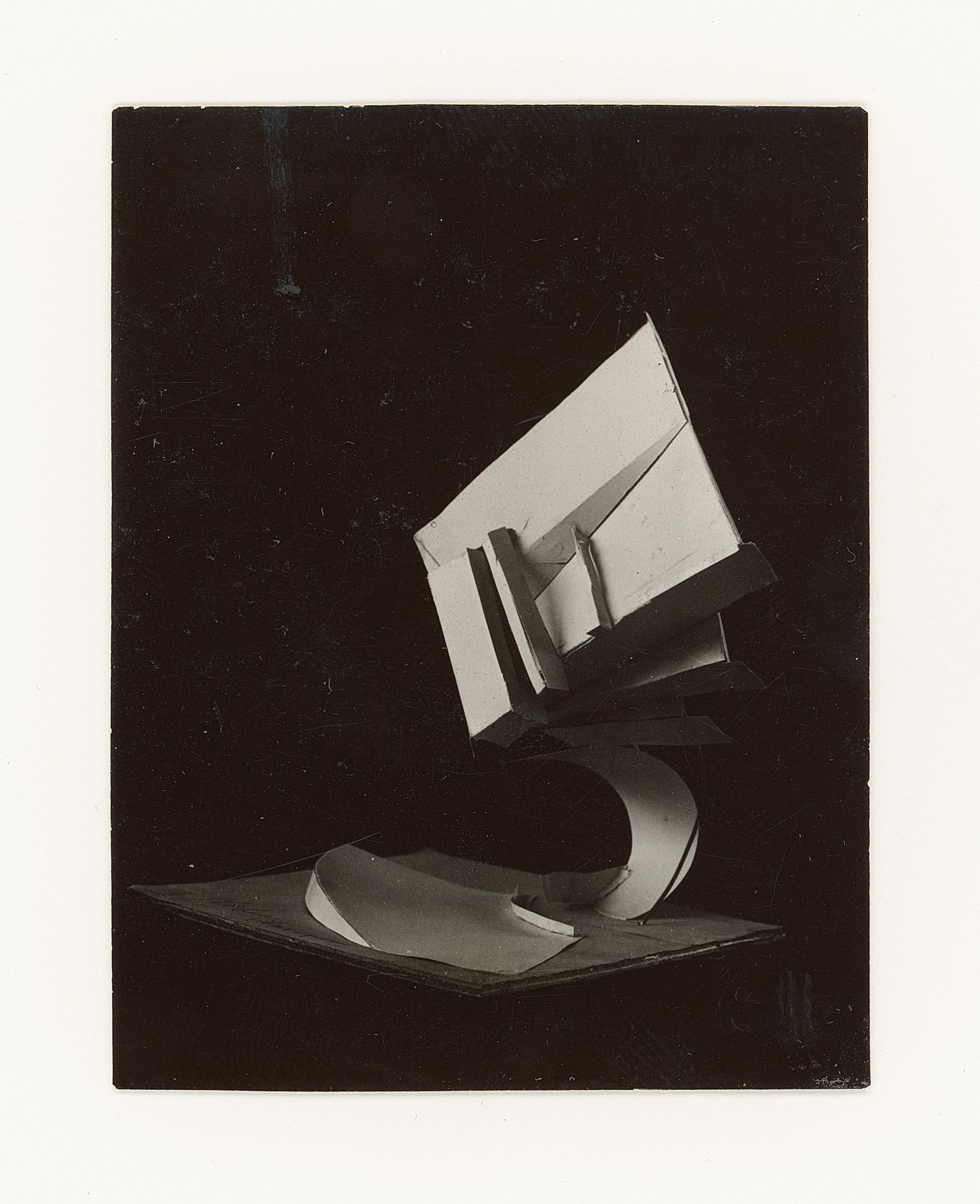 Photograph of a student model on the topic "Constructing a Voluminous Composition Based on Correlation of Mass (Cube) and Support" for the "Space" course at the Vkhutemas (Higher State Artistic Technical Studios), Moscow