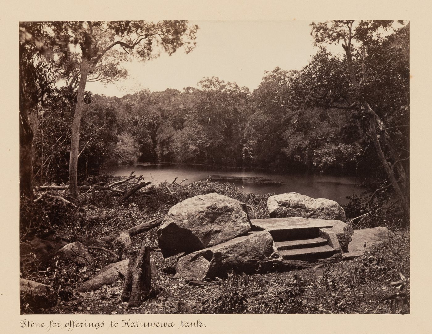 View of an offering site and the Kalawewa water tank, Kalawewa, Ceylon (now Sri Lanka)