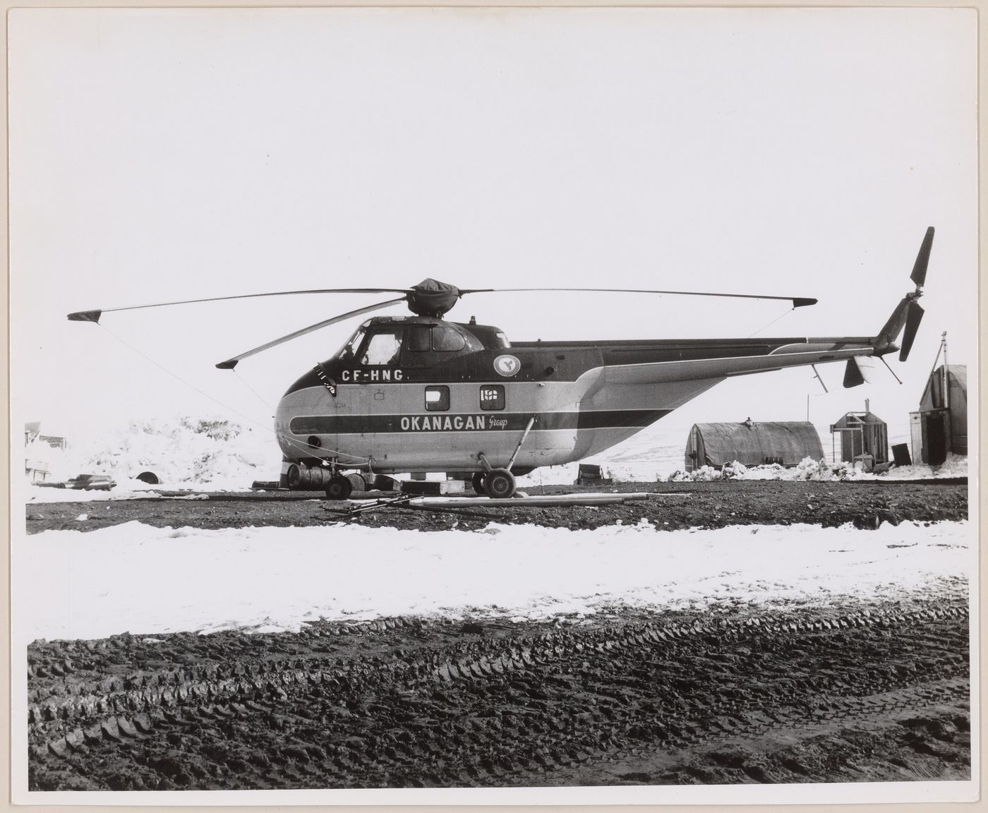 View of Okanagan helicopter at DEW Line radar station FOX-3, Dewar Lakes, Nunavut, Canada