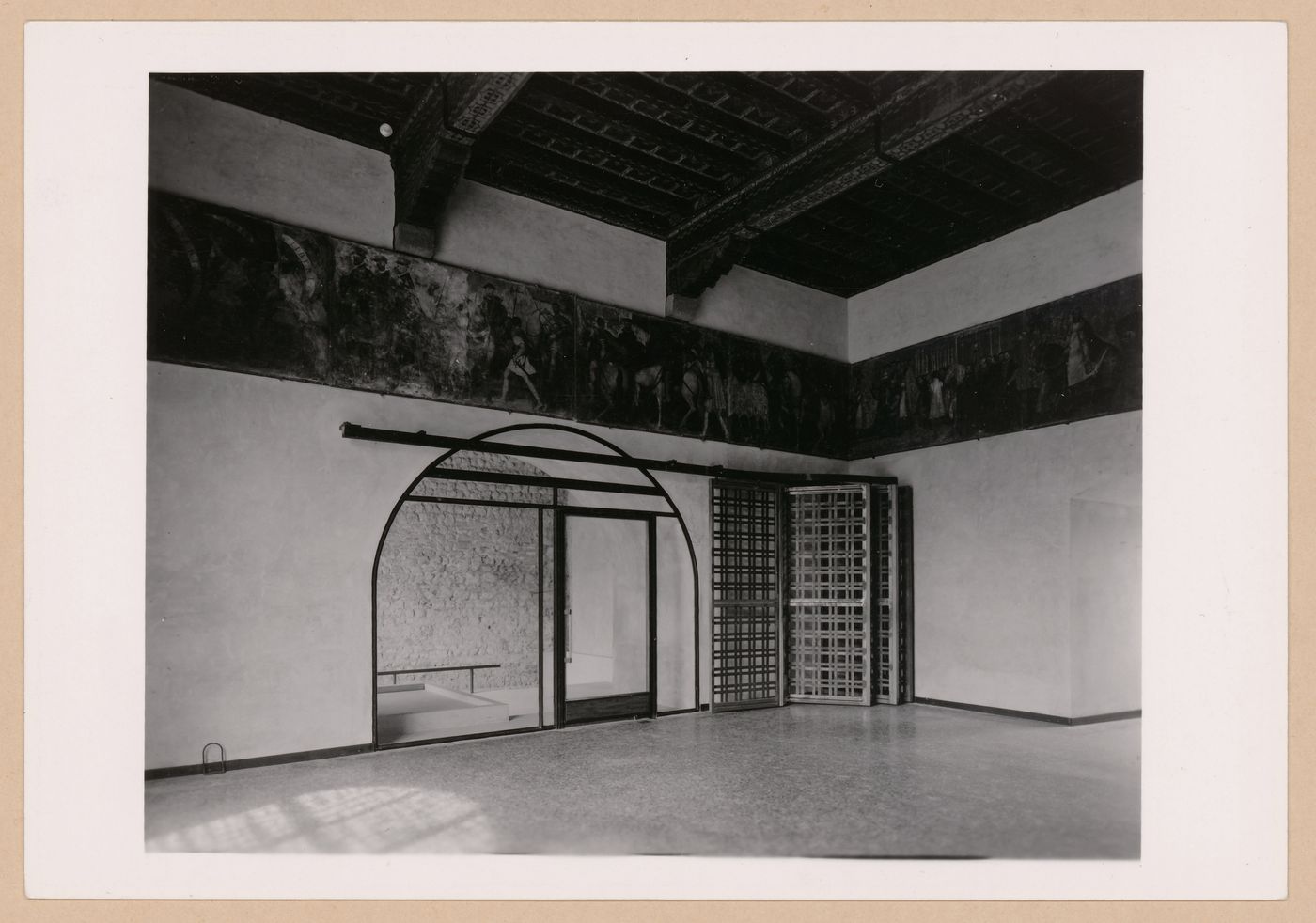 Interior view of a gallery showing frescos and a doorway, Museo di Castelvecchio, Verona, Italy