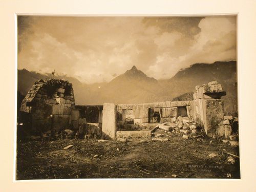 View of the Temple of the Three Windows with mountains in the background, Sacred Plaza, Machu Picchu, Peru